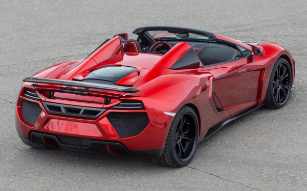 Red McLaren MP4-12C Spider supercar with black rims displayed on a gray asphalt surface, featured as an HD PC desktop wallpaper and background.