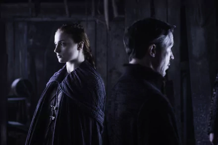 Sansa Stark and Petyr Baelish from Game of Thrones, portrayed by Sophie Turner and Aidan Gillen, in a dark, moody 4K Ultra HD PC desktop wallpaper.