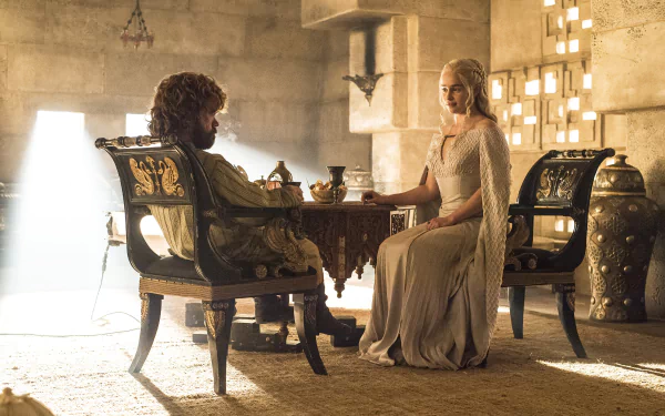 HD desktop wallpaper featuring Daenerys Targaryen and Tyrion Lannister from the TV show Game of Thrones, portrayed by Emilia Clarke and Peter Dinklage.