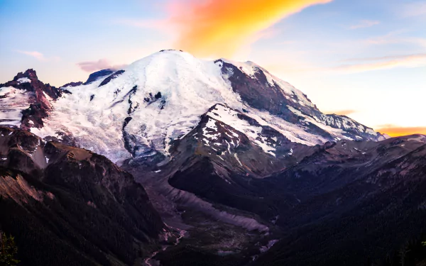 HD PC desktop wallpaper: Mount Rainier snow-covered peak and alpine valleys at sunrise, vivid sky hues — nature mountain landscape, snowy mountain background.