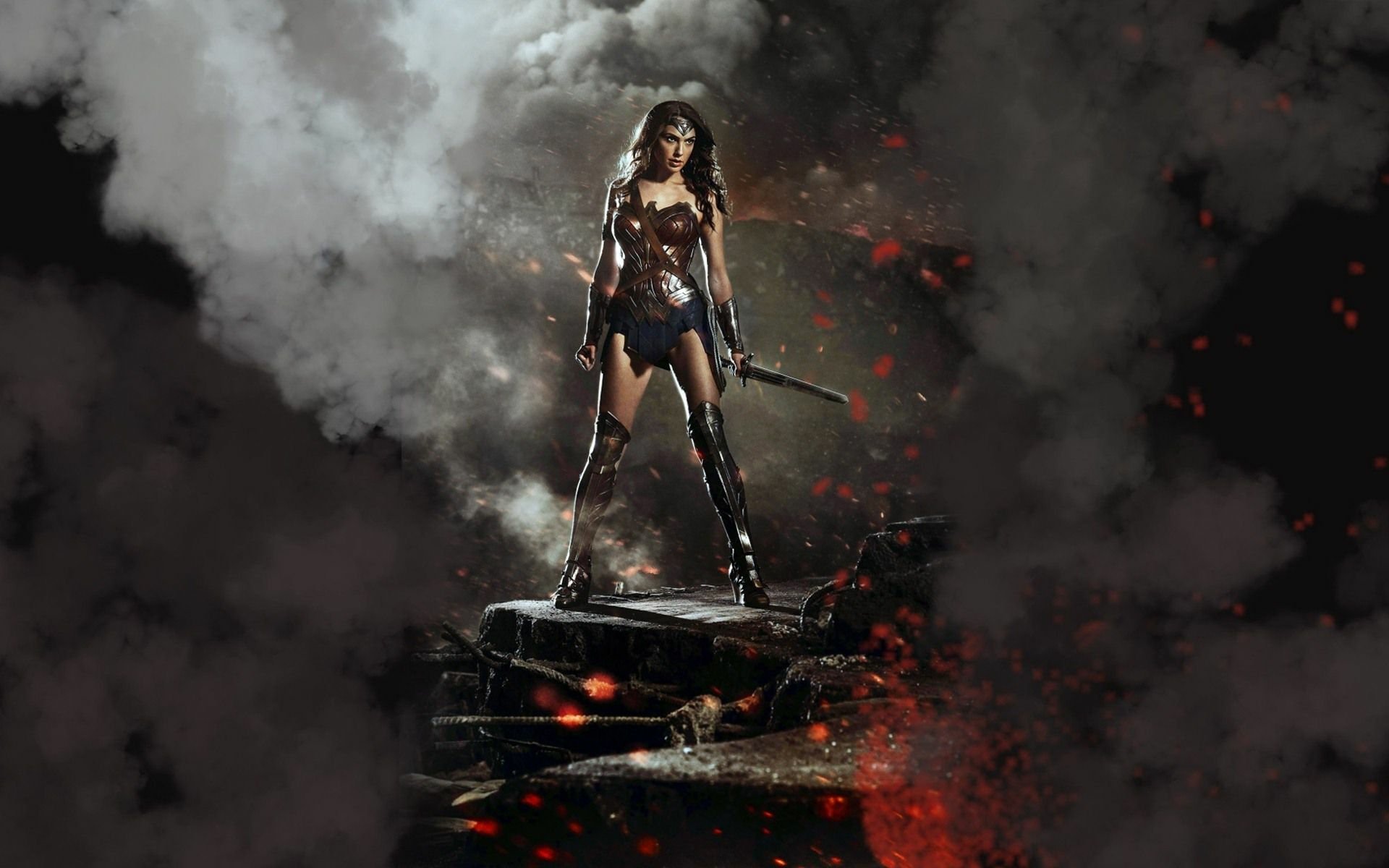 Gal Gadot as Wonder Woman stands confidently amidst smoke and debris in this HD wallpaper from Batman V Superman: Dawn Of Justice, capturing her powerful presence.