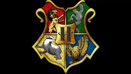 HD wallpaper featuring the iconic Hogwarts crest from Harry Potter and the Philosopher's Stone, showcasing the four houses: Gryffindor, Slytherin, Hufflepuff, and Ravenclaw.