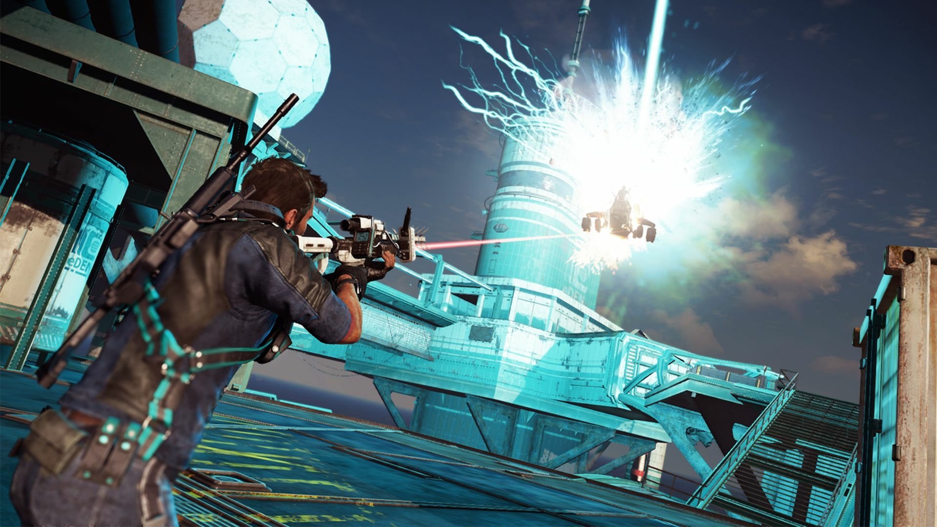 Rico Rodriguez from Just Cause 3: Bavarium Sea Heist aims his weapon at an explosive device on a futuristic platform in this HD PC desktop wallpaper.