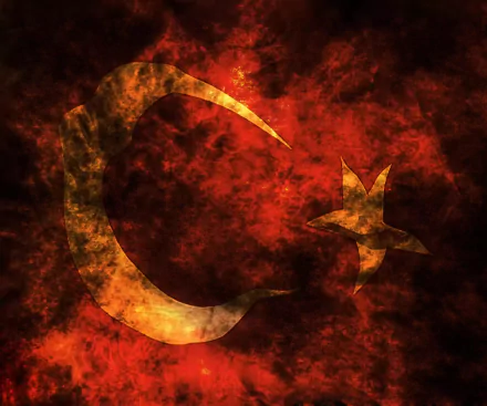 HD desktop wallpaper featuring the flag of Turkey, showcasing a vibrant design with a bold crescent and star against a dramatic red background.