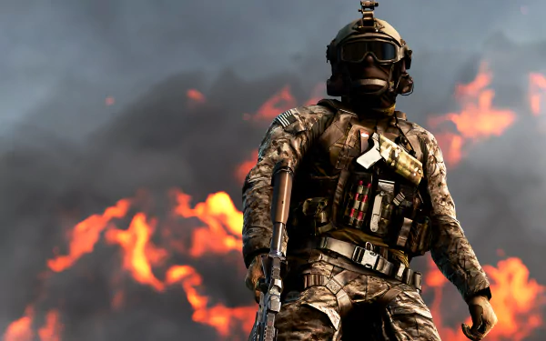 A Battlefield 4 soldier stands in full combat gear amid intense flames, captured in a 4K Ultra HD video game wallpaper for PC desktop backgrounds.