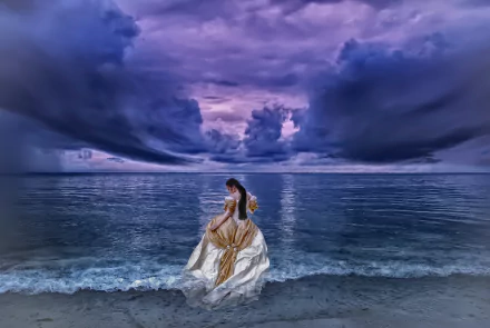Artistic HD PC desktop wallpaper/background: a woman in an ornate gown at the ocean horizon, standing where waves meet shore beneath dramatic purple clouds.