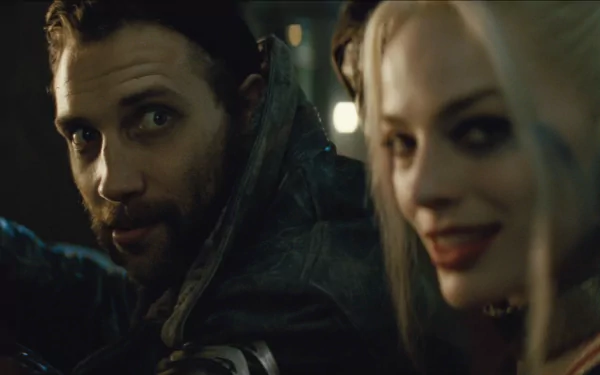 Image of Captain Boomerang (Jai Courtney) and Harley Quinn (Margot Robbie) from the movie Suicide Squad, captured in a dynamic moment, serving as HD wallpaper.