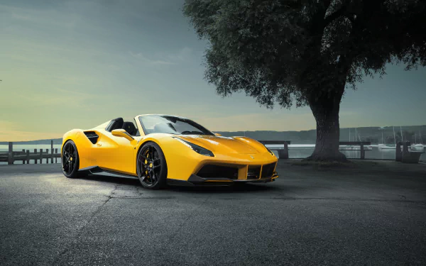 Yellow Ferrari 488 Spider supercar parked near a tree at sunset, captured in 4K Ultra HD for a PC desktop wallpaper and background.
