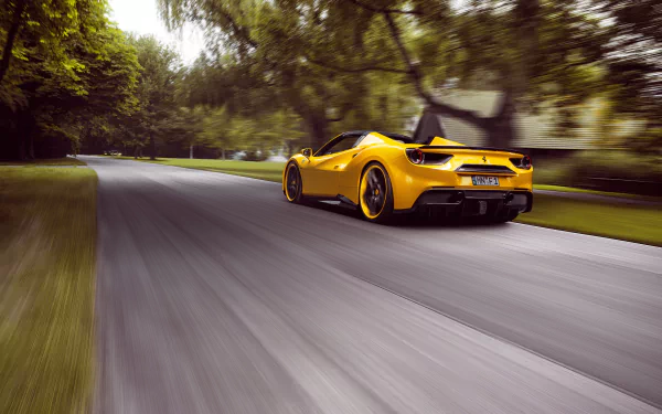 Yellow Ferrari 488 Spider supercar racing along a tree-lined road — 4K Ultra HD PC desktop wallpaper.