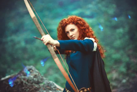 A woman in cosplay as Merida from the movie Brave draws a bow, set against a lush, mystical backdrop, showcasing her fierce determination and vibrant red hair.