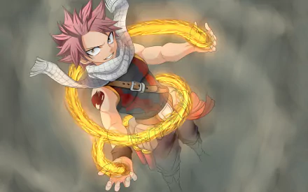 Natsu Dragneel from the anime Fairy Tail conjures flames in this vibrant HD wallpaper, showcasing his dynamic pose and fierce determination.
