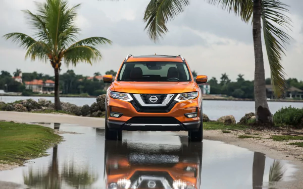 HD desktop wallpaper featuring an orange Nissan Rogue SUV parked on a reflective wet surface with palm trees and water in the background.