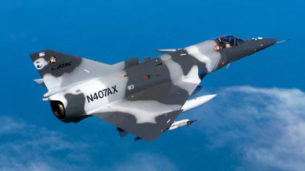 An IAI Kfir jet fighter soaring through the sky, showcasing its military design. This HD wallpaper captures the sleek contours and camouflage of the aircraft against a blue backdrop.