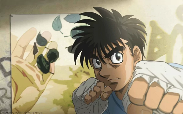 A dynamic HD wallpaper featuring Makunouchi Ippo from the anime Hajime no Ippo, showcasing his focus and determination in the boxing ring.