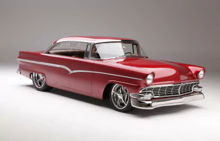 4K Ultra HD wallpaper of a red 1956 Ford Victoria hot rod with sleek chrome accents and custom wheels against a neutral gray background.