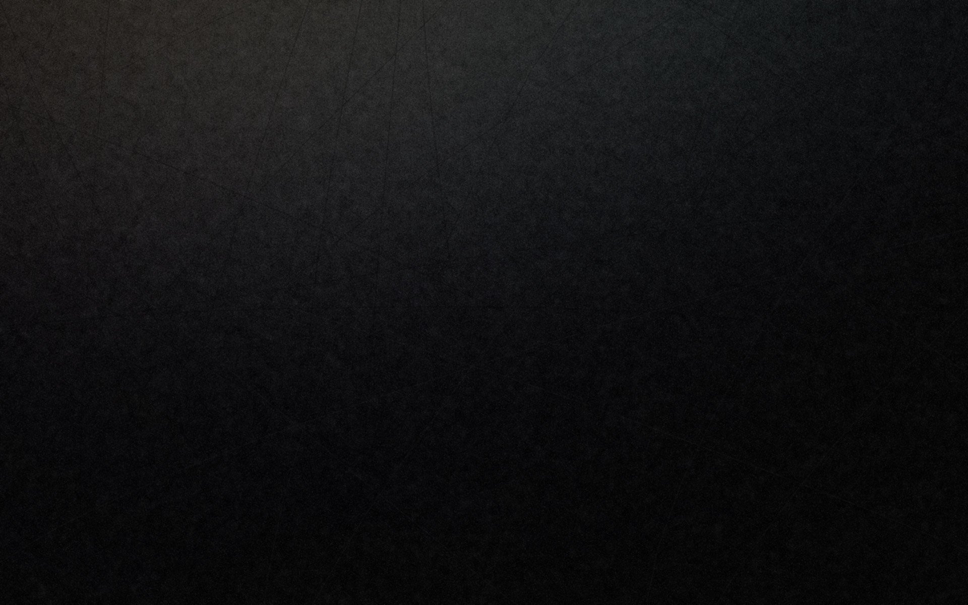 Abstract dark textured surface creating a subtle, minimalistic HD desktop wallpaper background.