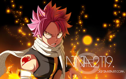 HD desktop wallpaper featuring Natsu Dragneel from the anime Fairy Tail, surrounded by fiery sparks and an intense glowing background.