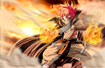 An HD desktop wallpaper featuring Natsu Dragneel from the anime Fairy Tail. Natsu, wearing a scarf, is depicted with a fiery background, symbolizing his dragon slayer powers.