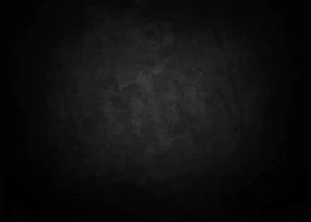 Abstract textured black background featuring subtle variations, designed as a HD PC desktop wallpaper to enhance visual aesthetics.
