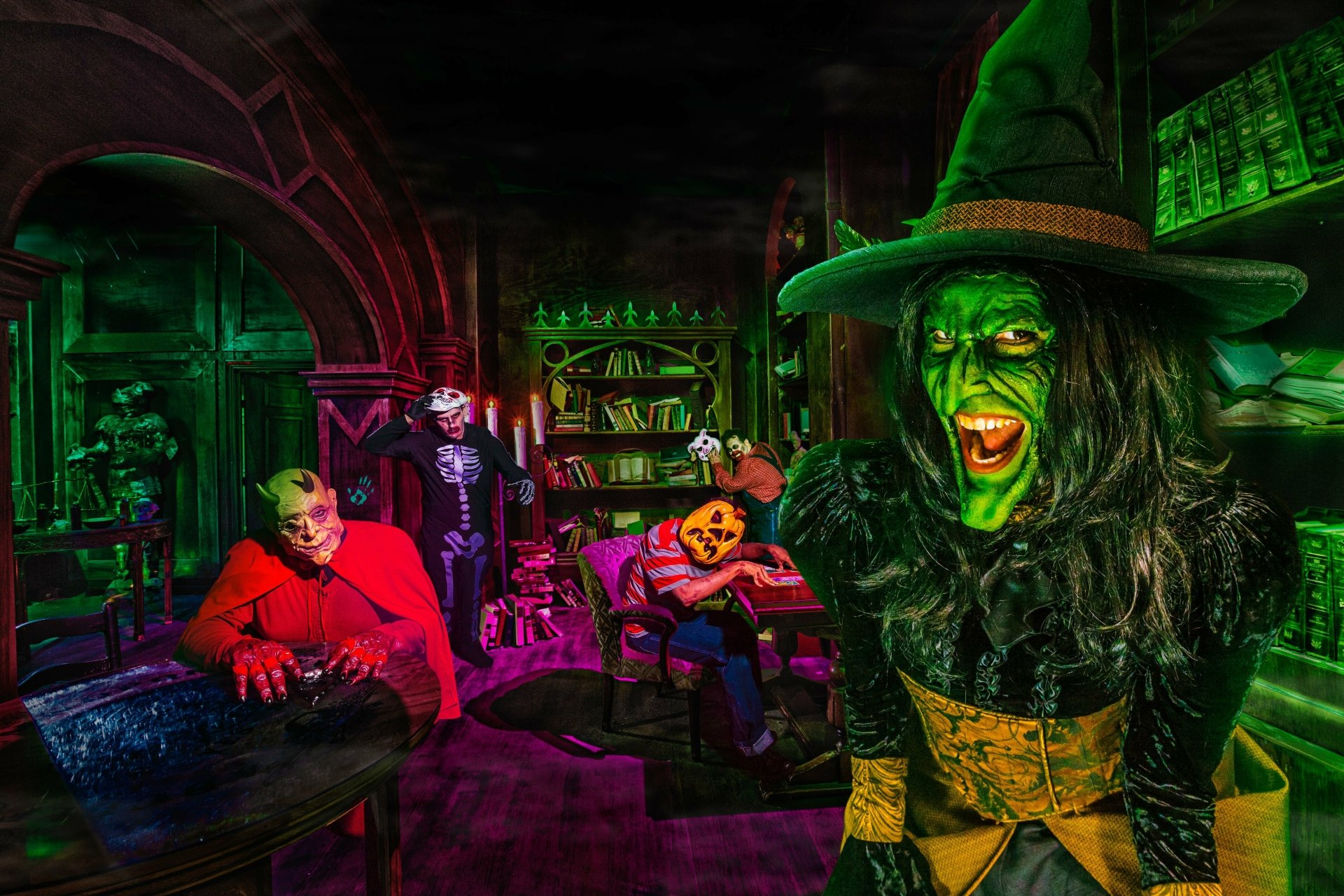 A vivid 4K Ultra HD Halloween horror scene featuring a green-faced witch and classic trick-or-treat characters in a spooky, eerie holiday setting.