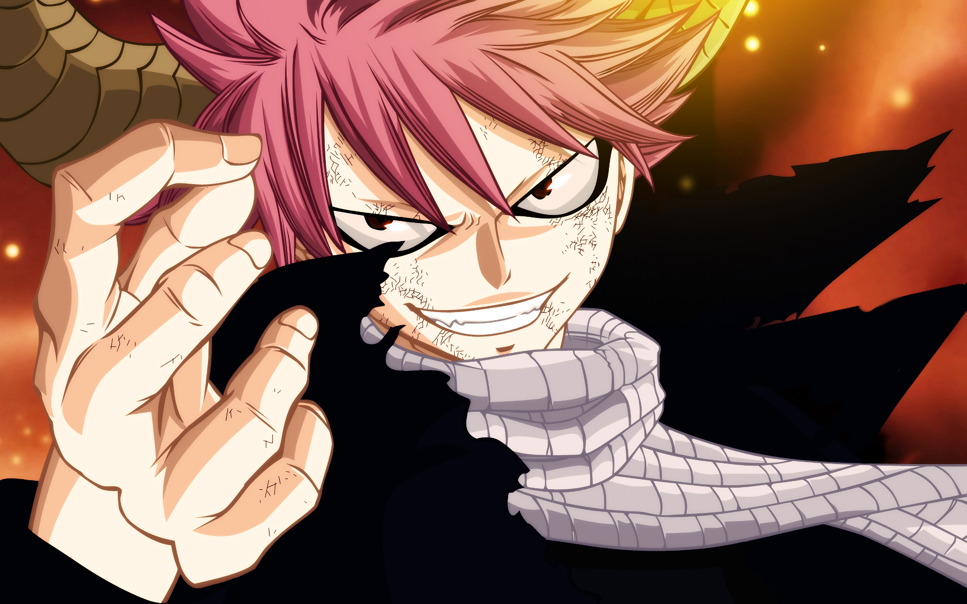 Natsu Dragneel from the anime Fairy Tail, showcasing his signature confident smile and dynamic pose against a vibrant background, makes a captivating HD desktop wallpaper.
