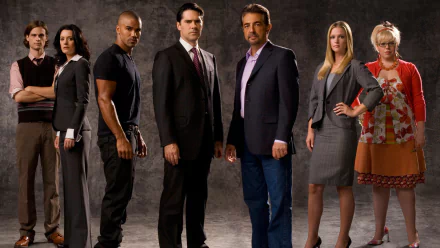 HD PC desktop wallpaper featuring the main cast of the TV show Criminal Minds posed against a dark background.