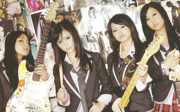 HD PC desktop wallpaper featuring the Japanese rock band Scandal posing with guitars against a collage-style background, highlighting their music vibe.