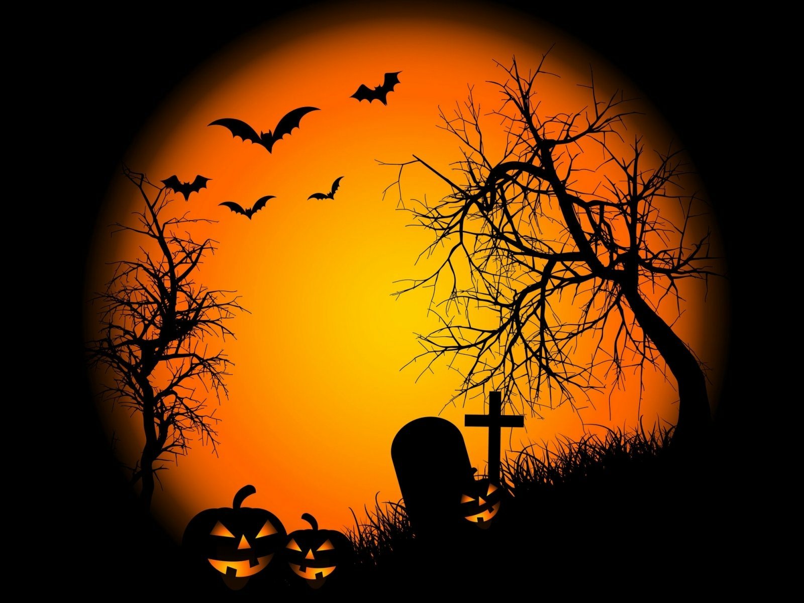 HD PC desktop wallpaper featuring a Halloween holiday scene with silhouetted bats, bare trees, a grave, and a glowing orange full moon background.