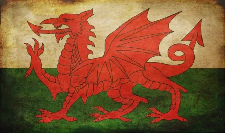 HD PC desktop wallpaper featuring the flag of Wales with a red dragon on a green and white textured background.