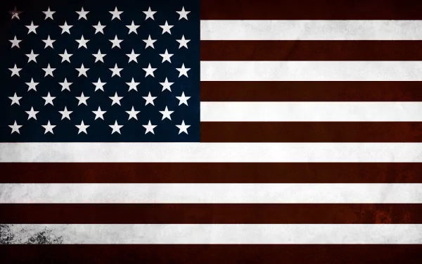 A high-definition desktop wallpaper featuring a man-made American flag, showcasing the stars and stripes in bold, vivid colors against a textured background.