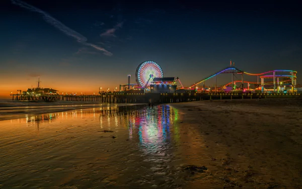 Los Angeles Santa Monica Pier night sand ferris wheel pier beach man made amusement park HD Desktop Wallpaper | Background Image