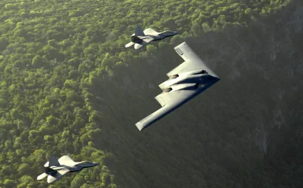 HD desktop wallpaper featuring a Northrop Grumman B-2 Spirit stealth aircraft flying over a lush green landscape, accompanied by two other military airplanes.