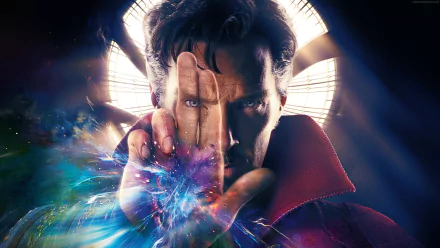 HD wallpaper of Benedict Cumberbatch as Doctor Strange, with intense colors and mystical effects in the background.