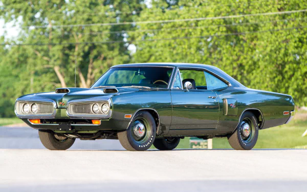 HD PC desktop wallpaper: dark green Dodge Coronet RT Hemi hardtop coupe parked on a sunlit road — classic Dodge Coronet vehicle.