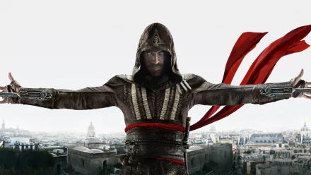 HD desktop wallpaper featuring Michael Fassbender in a scene from the movie Assassin's Creed, with the character standing against a cityscape backdrop, arms outstretched and wearing a hooded costume.