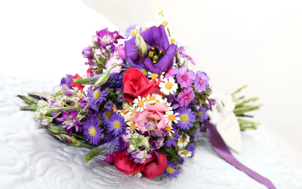 Vibrant man-made bouquet of purple chrysanthemums, pink eustoma and red roses on a white backdrop, HD PC desktop wallpaper