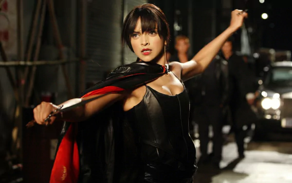 HD desktop wallpaper featuring Deepika Padukone in an intense action pose from the movie Chandni Chowk To China.