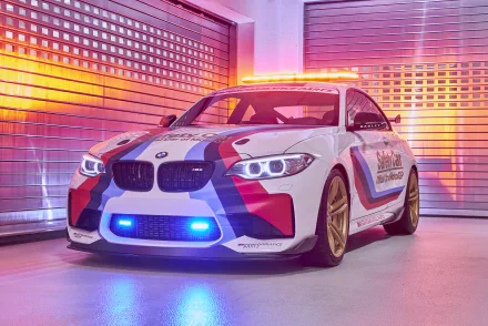 White BMW M2 Coupe race car with M-striped livery and blue underglow in neon-lit garage — 4K Ultra HD PC desktop wallpaper/background.