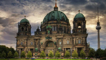 Berlin Cathedral, a grand religious landmark in Germany, stands majestically under a dramatic sky, captured in an HD desktop wallpaper and background.