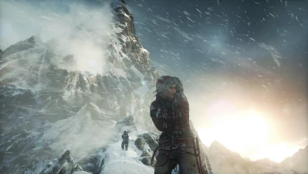HD desktop wallpaper of Lara Croft from the video game Rise of the Tomb Raider, depicting a snowy mountain scene with intense, stormy weather.