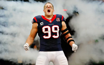 HD wallpaper featuring an energetic football player on the field with jersey number 99, celebrating with a roar.