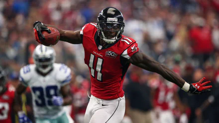 HD desktop wallpaper featuring Julio Jones in action on the football field, wearing his number 11 Atlanta Falcons jersey.