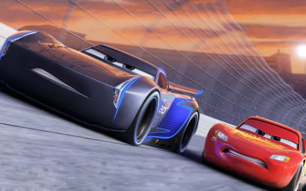 HD desktop wallpaper featuring Jackson Storm and Lightning McQueen racing on a track, from the Pixar Disney movie Cars 3.