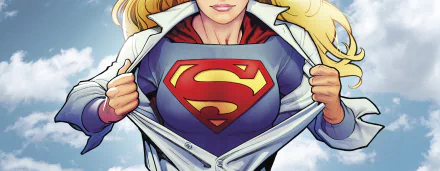 HD comic-style Supergirl reveals her iconic 'S' emblem beneath a white outer shirt, set against a bright sky, designed as a PC desktop wallpaper and background.