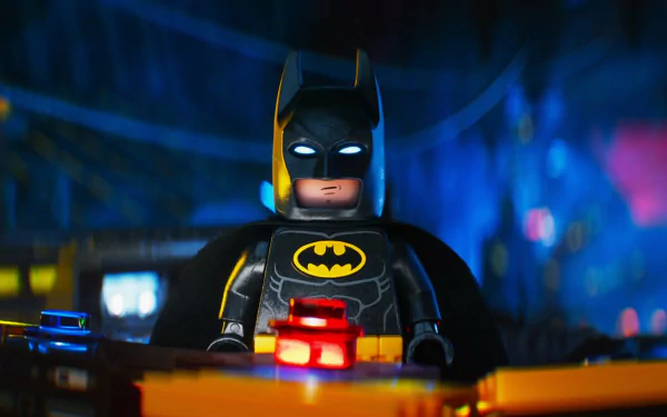 HD desktop wallpaper featuring Lego Batman from The Lego Batman Movie, showcasing him in a dark, vibrant setting with glowing eyes and a dramatic expression.