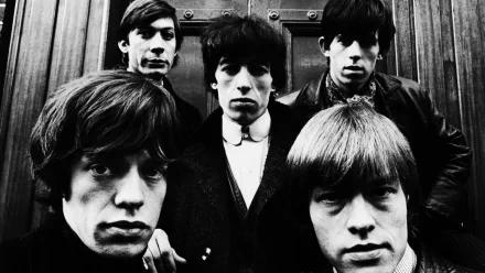 Black and white HD PC desktop wallpaper featuring The Rolling Stones in a classic group portrait from a TV show appearance.