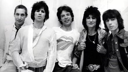 Black and white HD desktop wallpaper of The Rolling Stones band members posing together, capturing the iconic rock music vibe.
