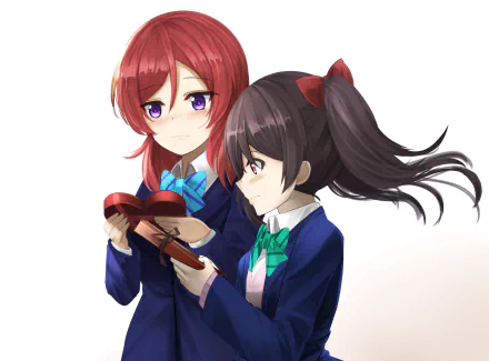 HD anime wallpaper featuring Love Live! characters Nico Yazawa and Maki Nishikino exchanging a heart-shaped box, themed around Valentine's Day.