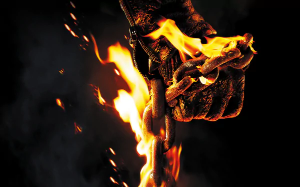 HD PC desktop wallpaper featuring a fiery, burning chain held by a gloved hand from the movie Ghost Rider: Spirit of Vengeance.