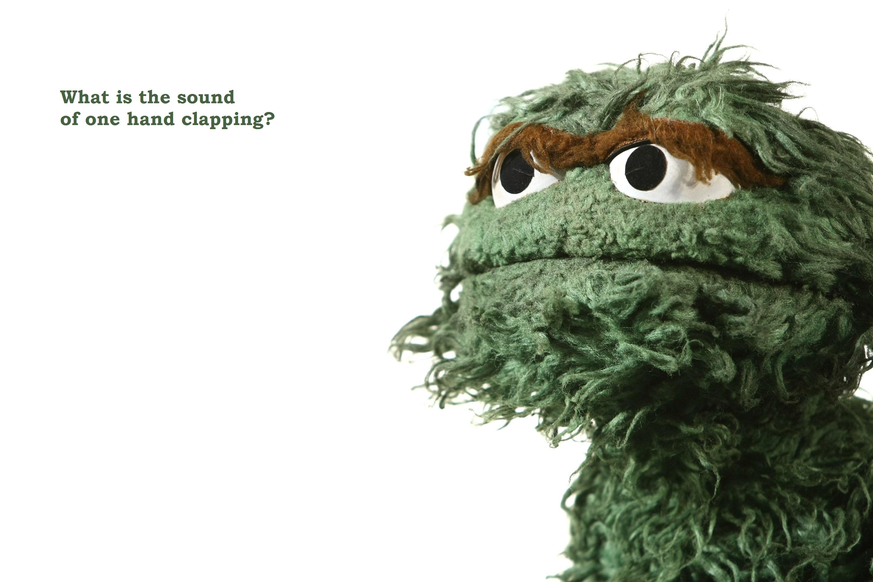 Oscar the Grouch in a vibrant and playful desktop wallpaper.